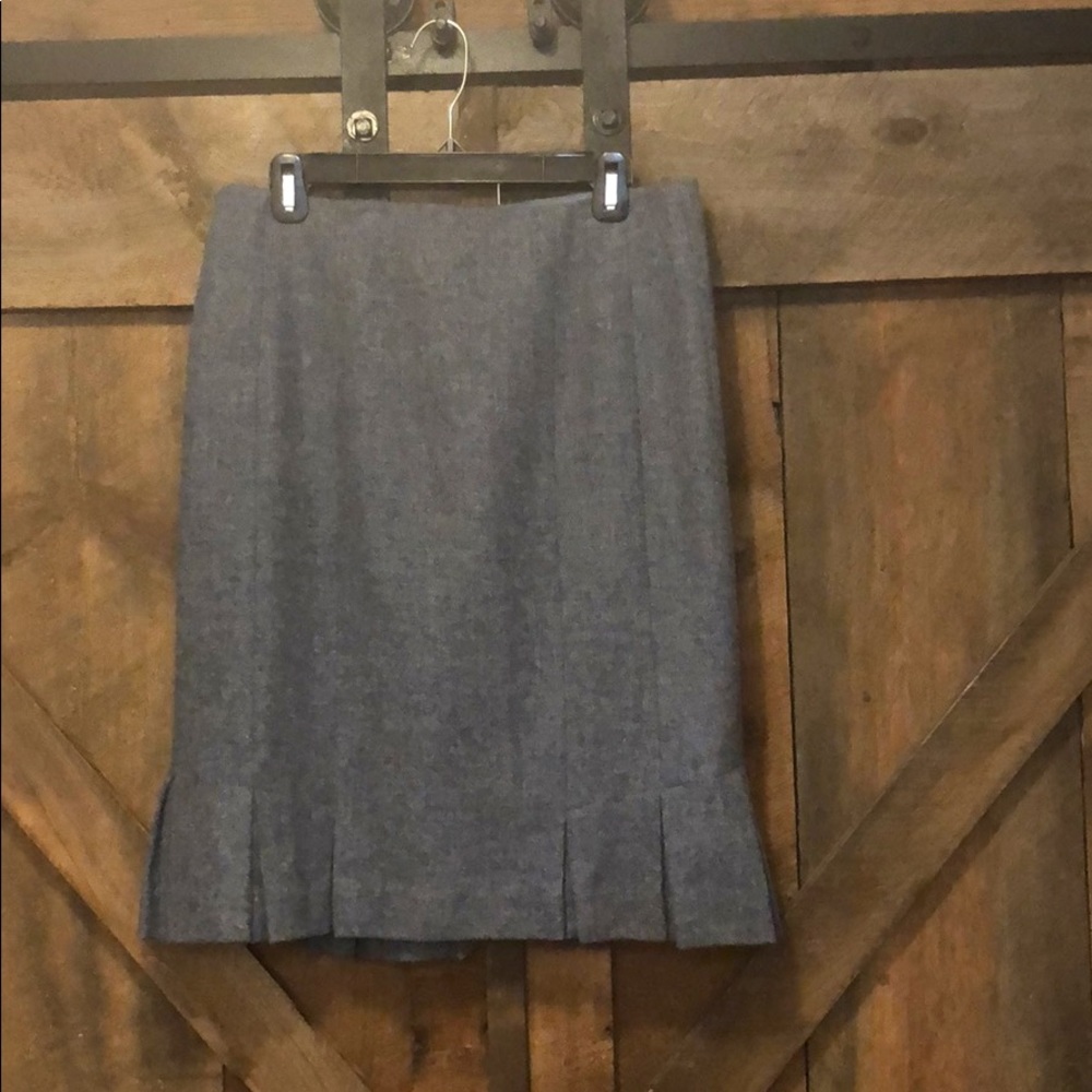 Light blue pleated wool skirt.